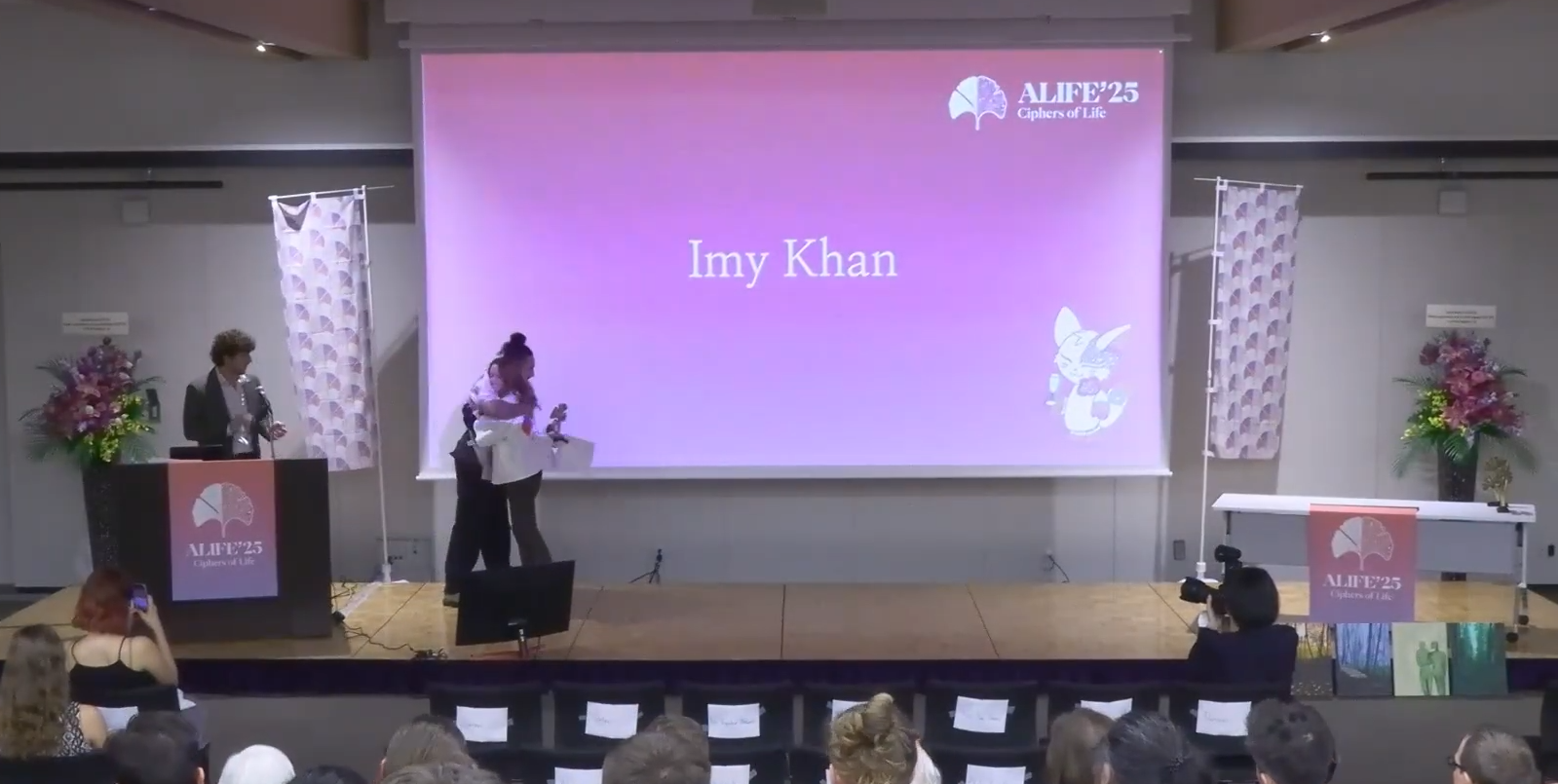 Receiving the award at ALIFE 2025 (Ciphers of Life) in Kyoto :)